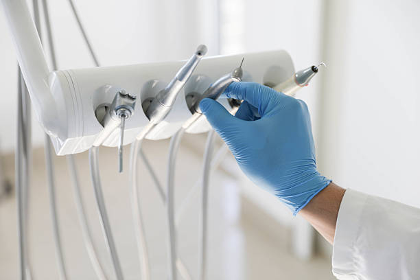 Professional Tooth Extraction technician working in Carleton, MI